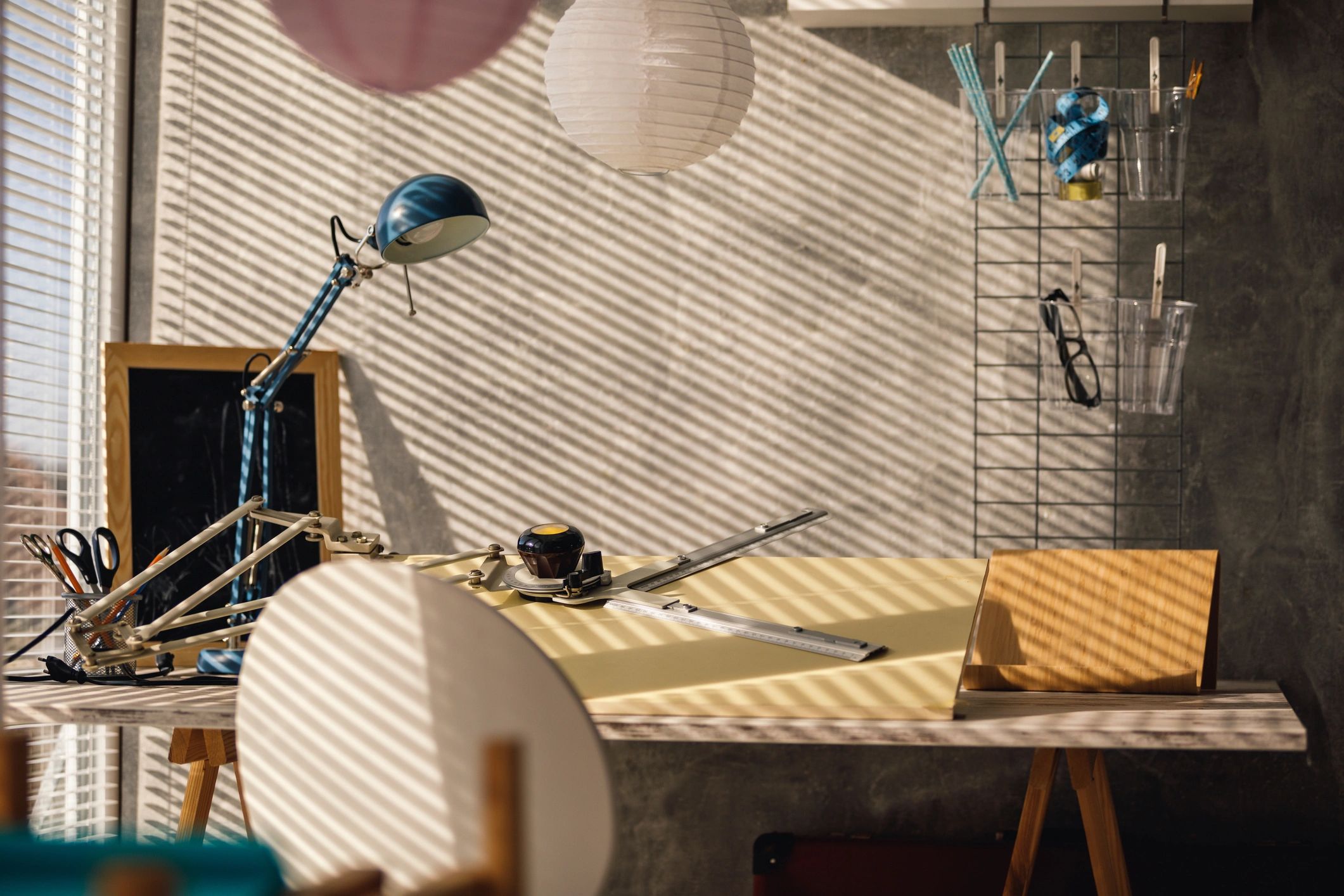 Sunlit workspace with desk and tools