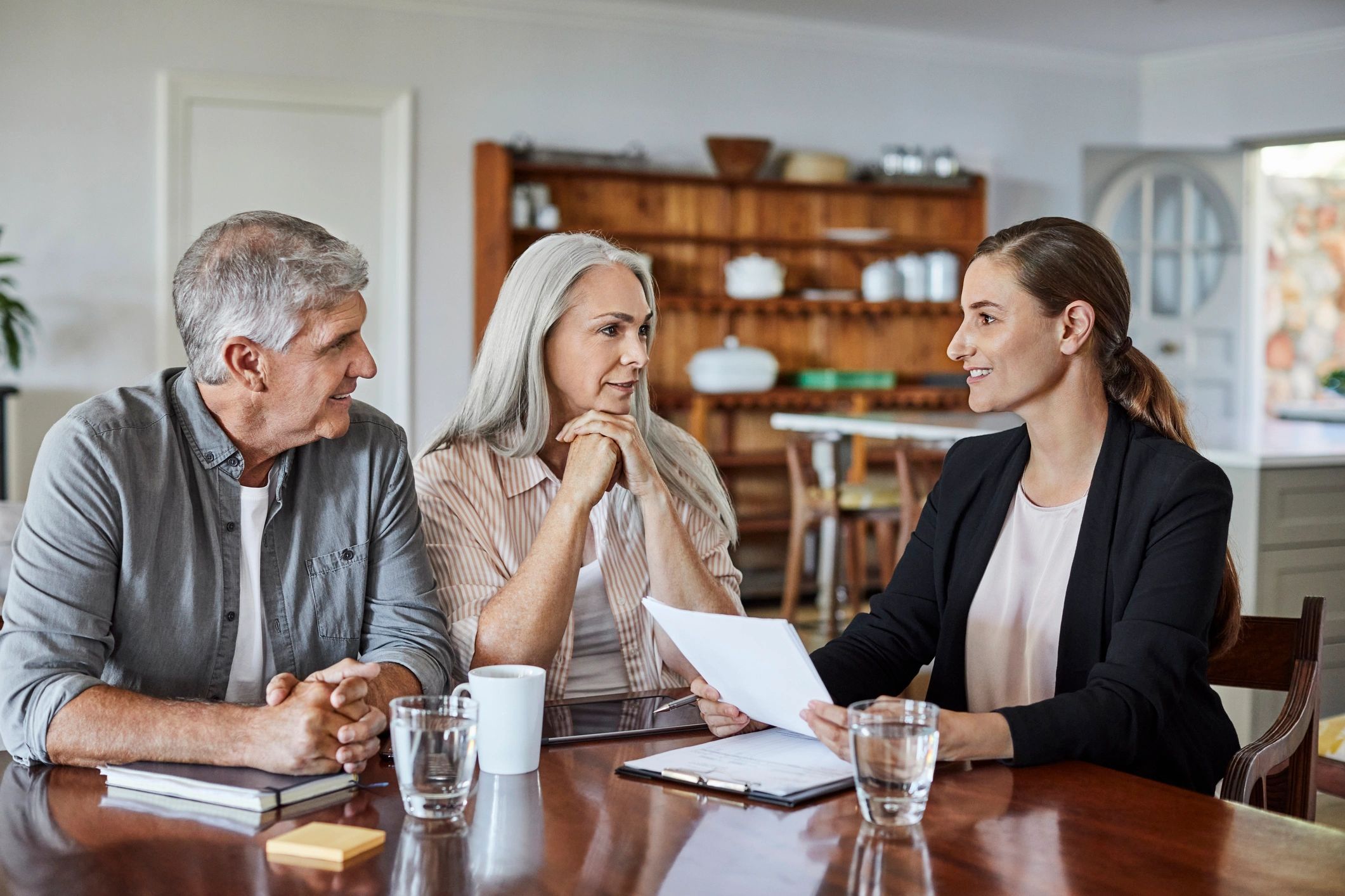 Family business planning meeting in warm light