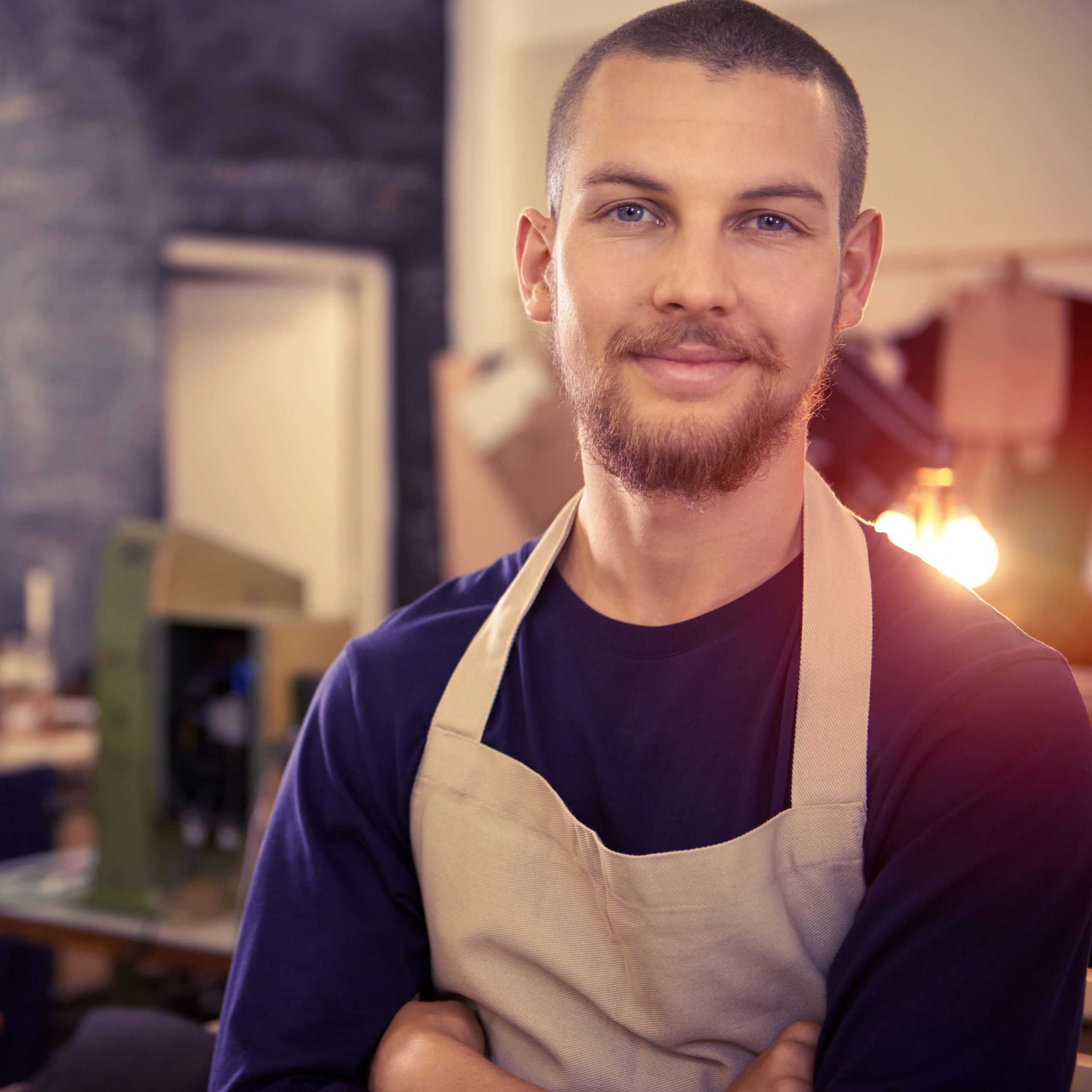 Portrait of a business owner in a workshop setting